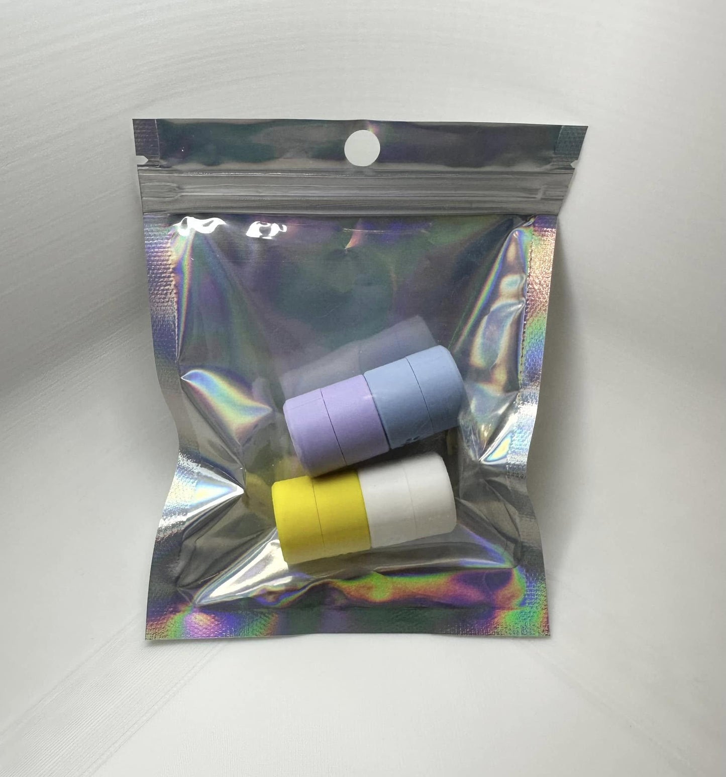 The Spring Tiny Hides pack for K9 nosework training includes Yellow, Periwinkle, White, and Ice Blue magnetic scent detection vessels. Made from durable, eco-friendly PLA, these hides are perfect for improving your dog’s scent detection skills.