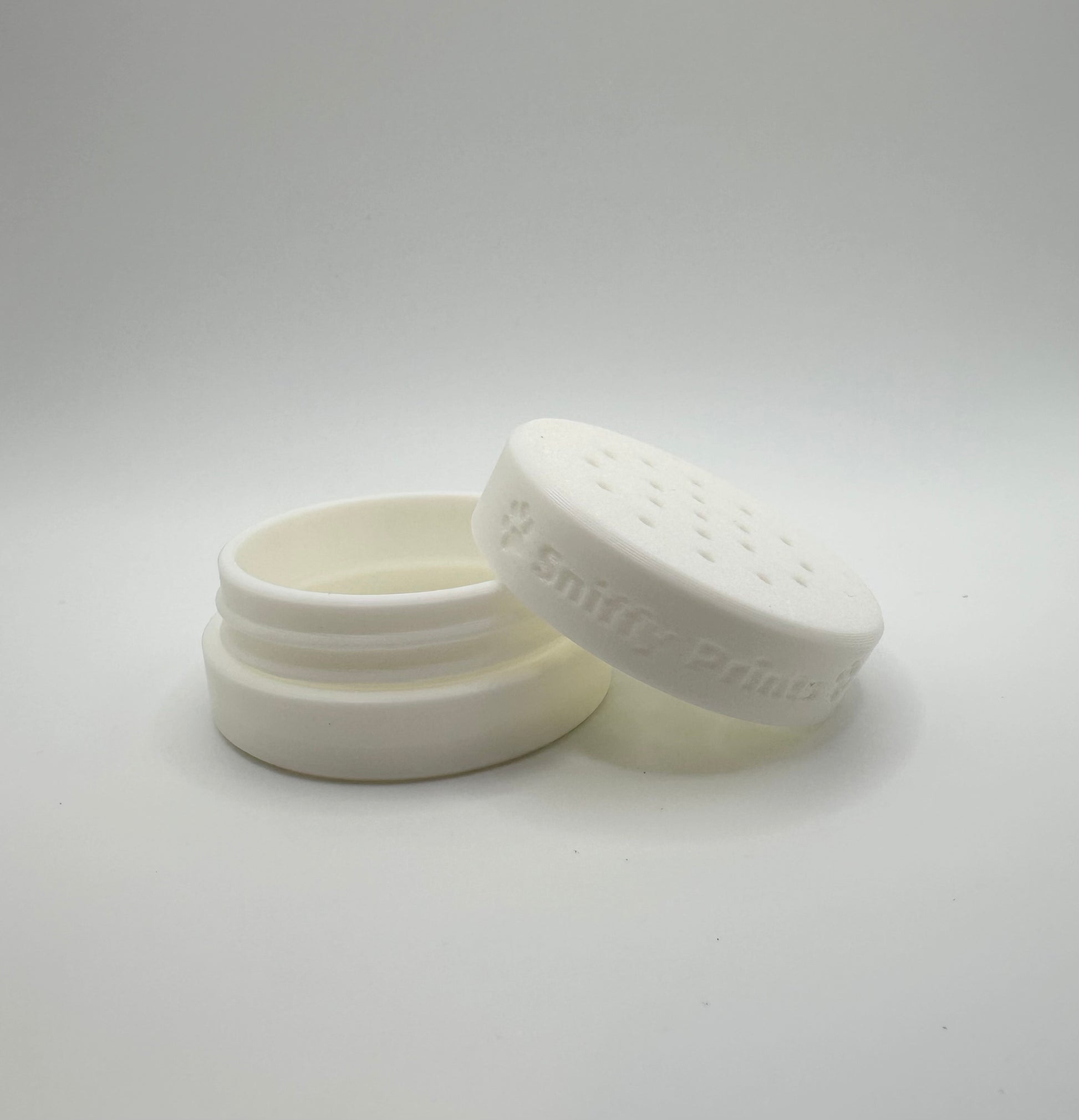 The white Odour Pod, designed for k9 nosework training. This scent detection vessel is made from durable, eco-friendly PLA.