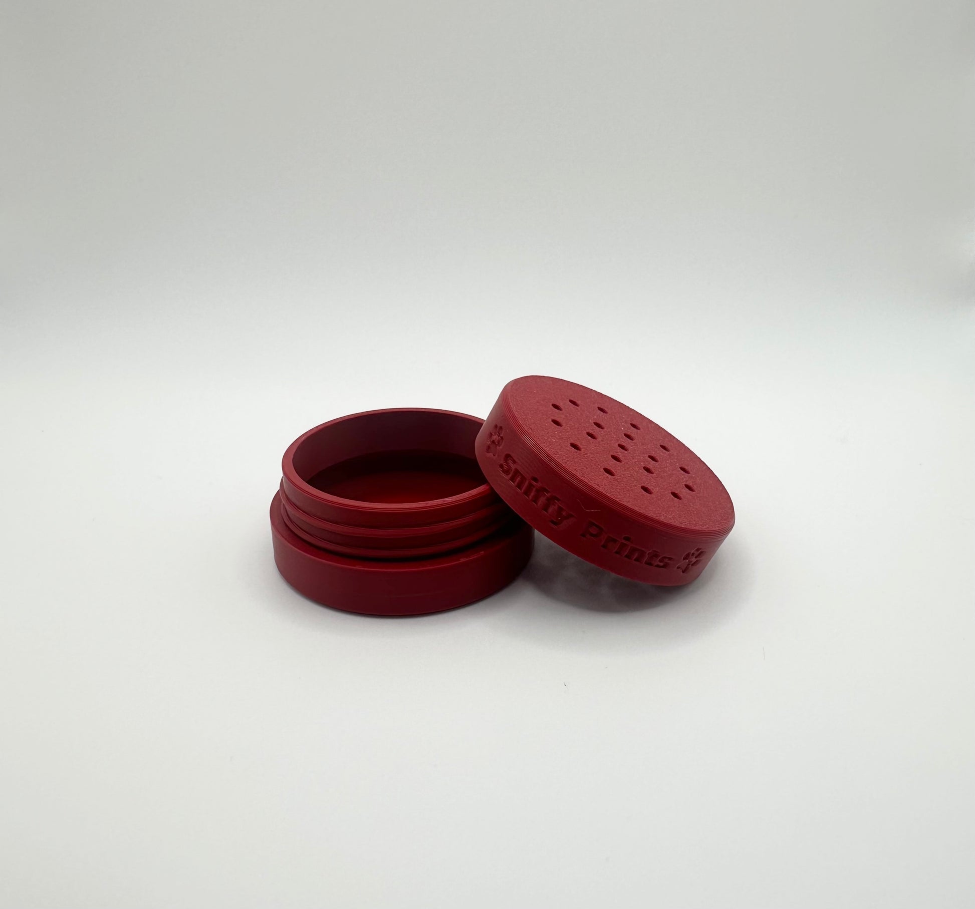 The Maroon Odour Pod, designed for k9 nosework training. This scent detection vessel is made from durable, eco-friendly PLA.