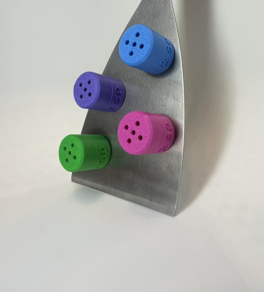 The BOLDS Tiny Hides pack, designed for K9 nosework training, includes Magenta, Cyan, Green, and Purple magnetic scent detection vessels. Made from durable, eco-friendly PLA, these hides are perfect for improving your dog’s scent detection skills.